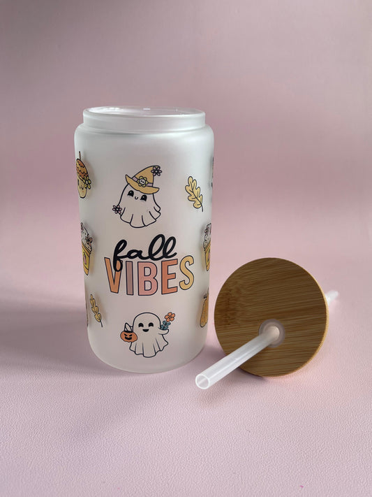 Tumbler with 'fall vibes' design, cute ghost, pumpkins on a pink background